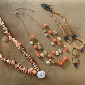 Necklace trio in orange.